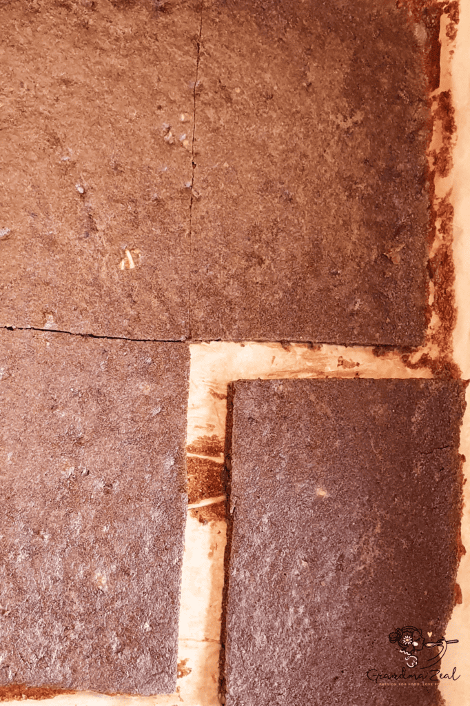 Rectangular low-carb coffee walnut cake cut into four equal pieces 