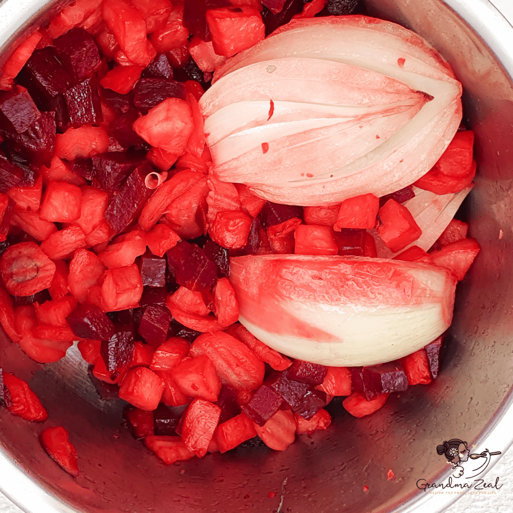 Cut vegetable  in the pot ready to cook beetroot soup