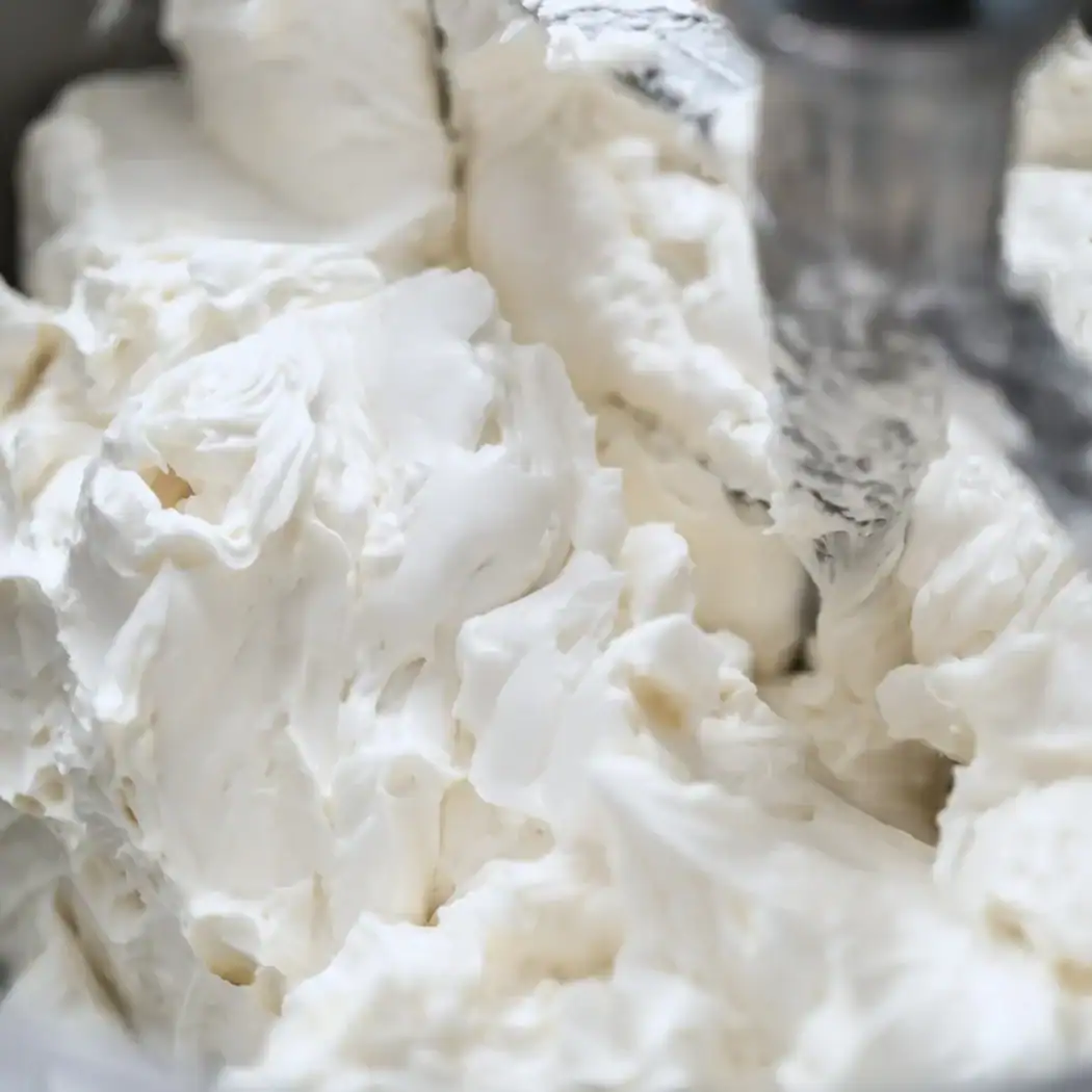 Smooth white creamy frosting — a versatile base for any flavour, used as the featured image