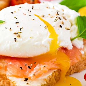a serving of bread with salmon and poached egg