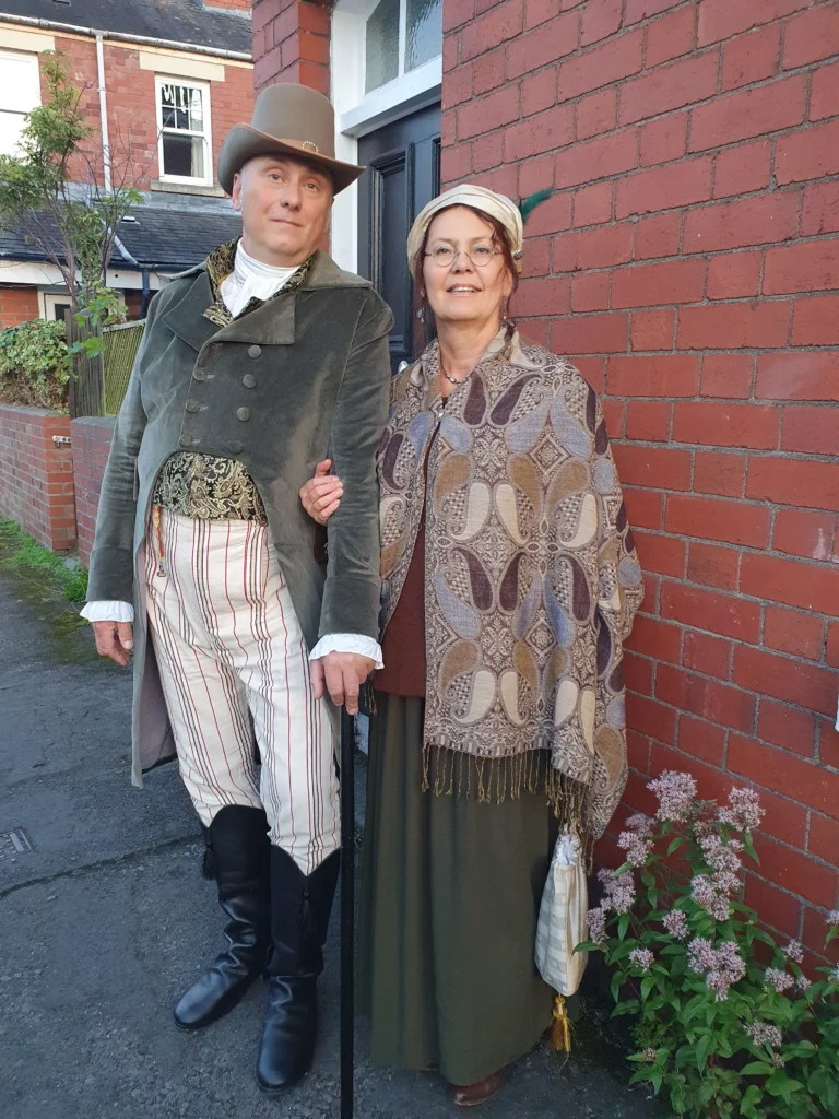 Helena and her husband in historical costumes at the Jane Austen Festival in Bath