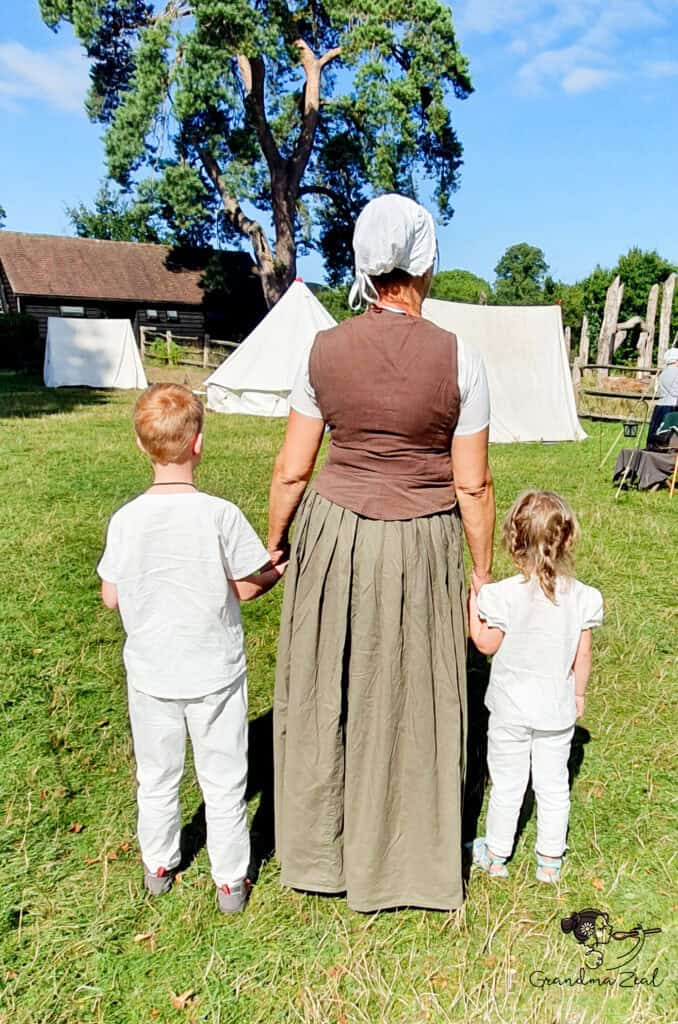 KEEPING IN SHAPE: MY JOURNEY AND THE TRUTH NO ONE TELLS YOU Helena with her grandchildren at a re-enactment, a moment that reflects her deeper “why.”