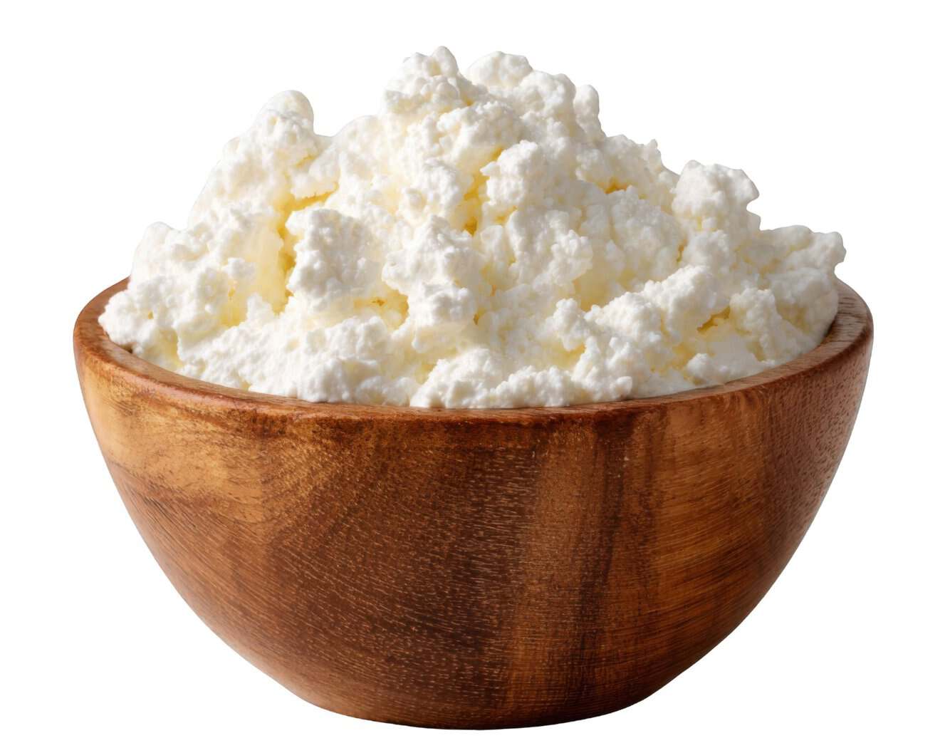 Wooden bowl of curded quark, similar to Polish twaróg, used in a protein breakfast bowl